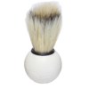 a picture of a shaving brush on white background